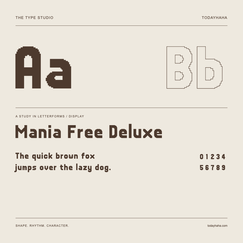 Mania Free Deluxe — Letterform study with sample sentence and numbers